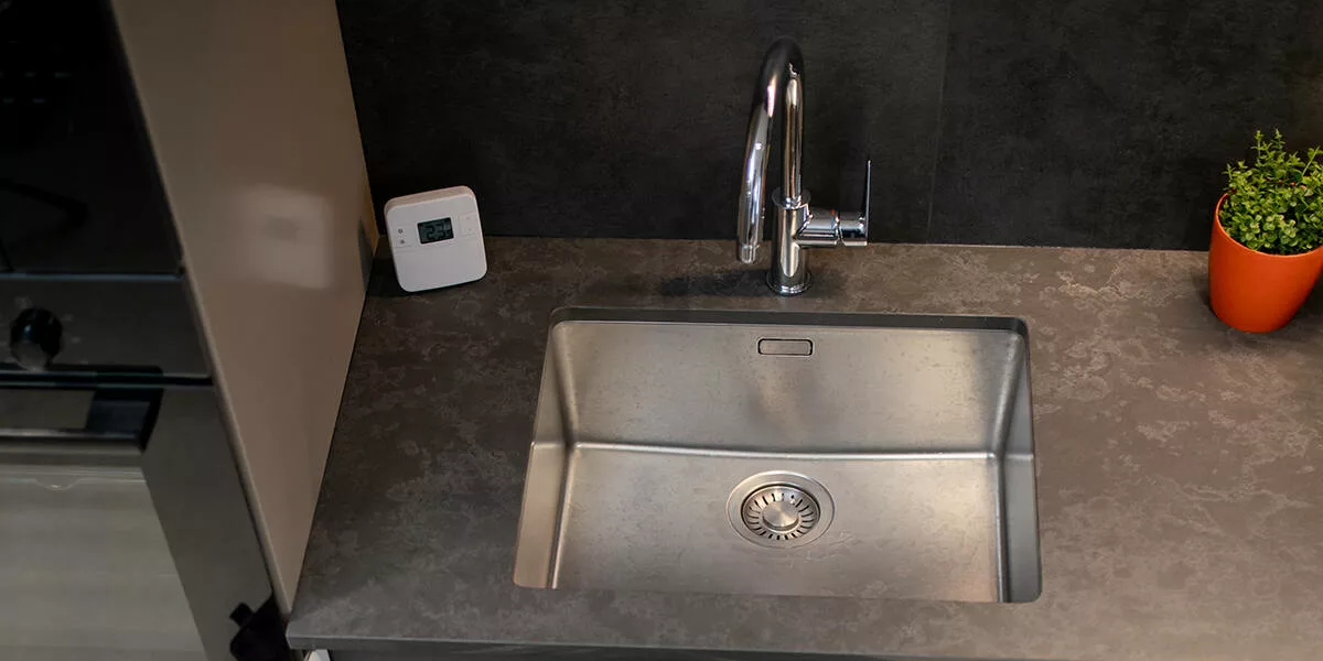 how to unclog a garbage disposal with standing water